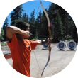An archer draws back a bow.